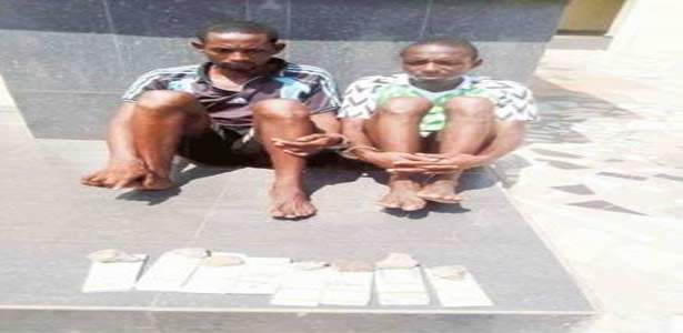 Two suspected armed robbers nabbed with fake $800,000 along Lokoja-Abuja highway